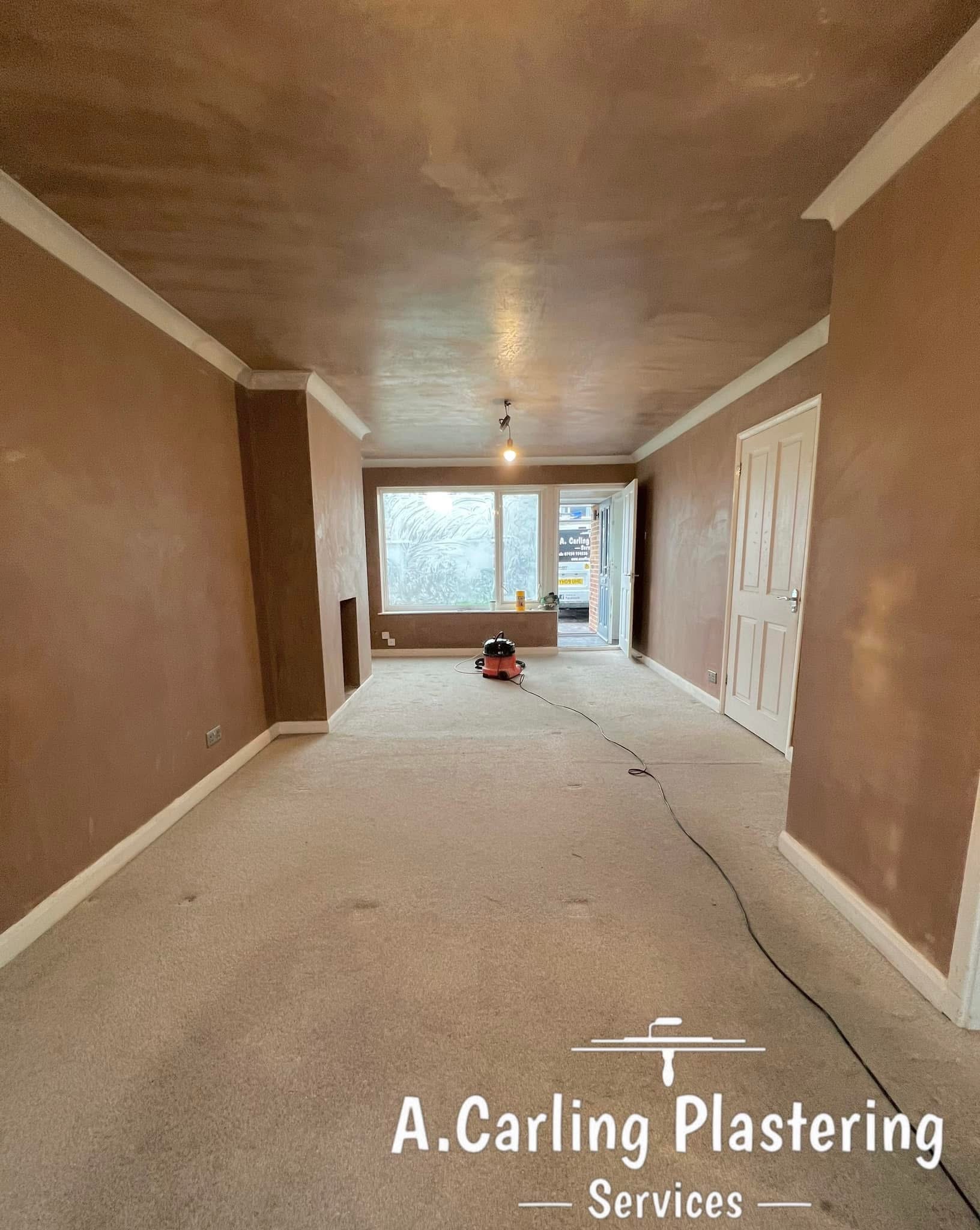 A long through lounge freshly skimmed, with new coving along the ceiling